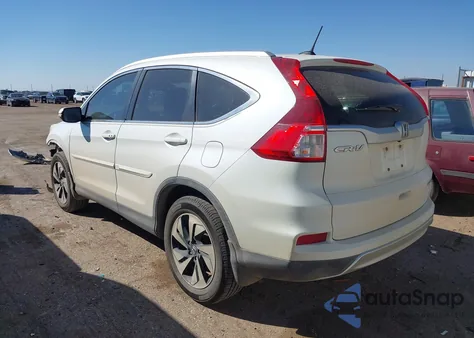 2015 Honda Cr-V Touring z USA, uszkodzony, nr VIN 5J6RM3H94FL021628